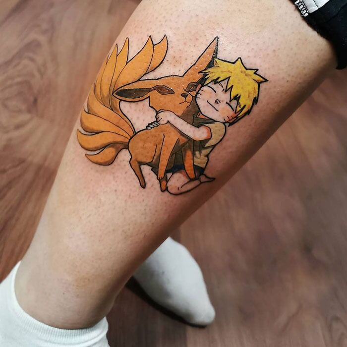Anime-inspired calf tattoo showcasing a boy hugging a fox-like creature, emphasizing coolness and creativity.