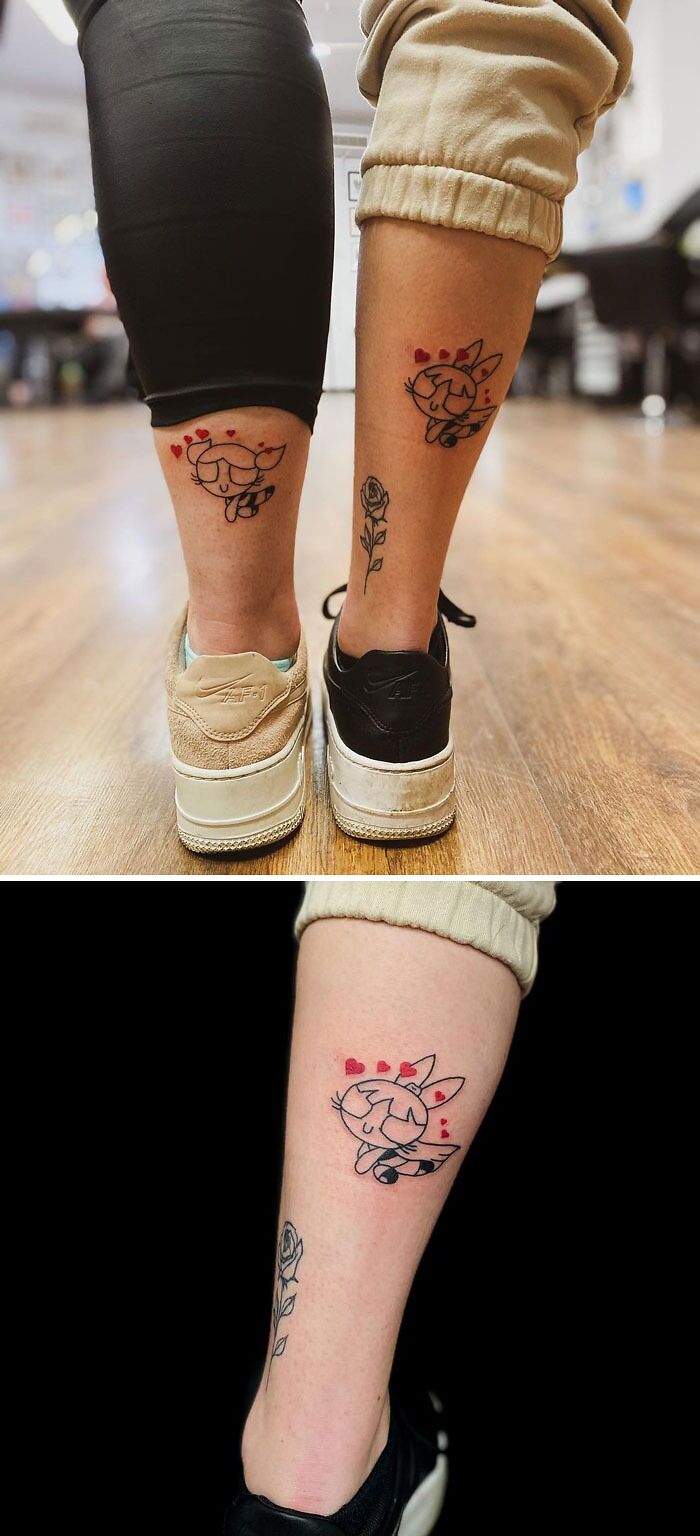 Calf tattoo featuring a cartoon character with hearts and a rose, showcasing cool tattoo design.