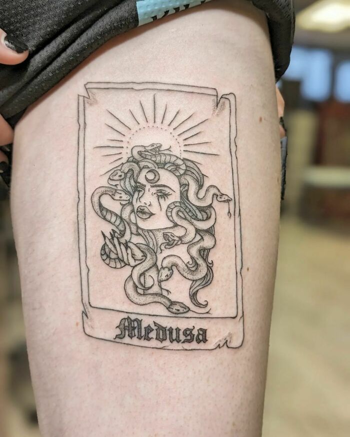 Medusa tattoo design on a person's thigh, symbolizing empowerment and self-love.