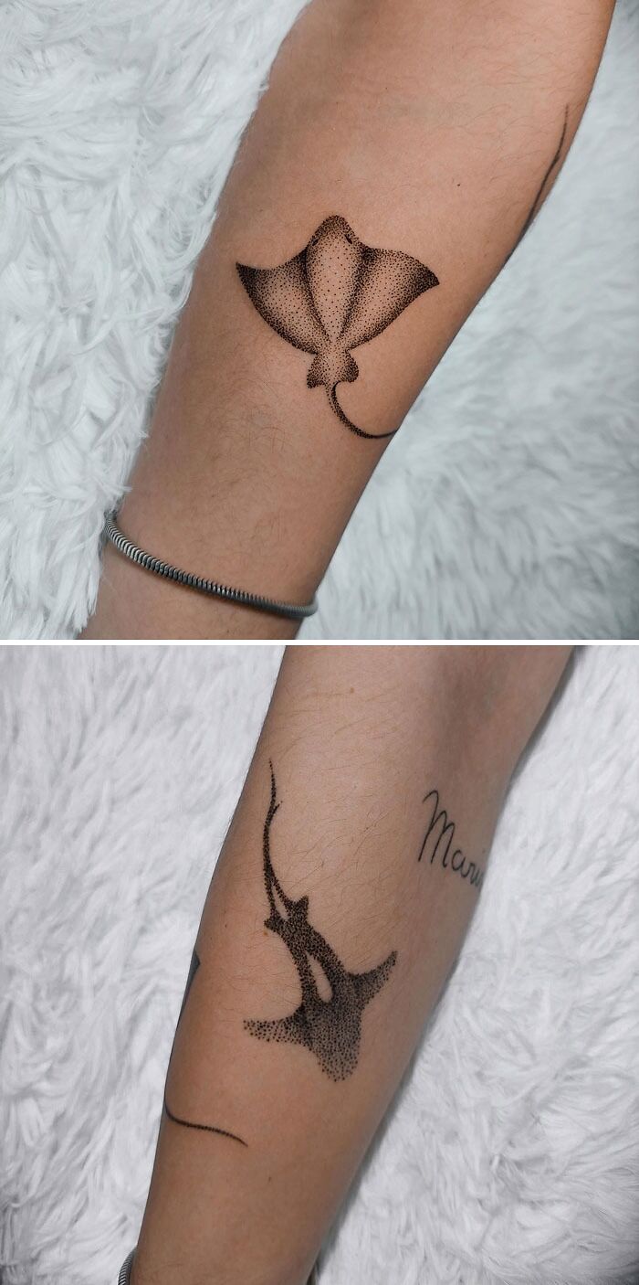 Minimalist stingray tattoo on the forearm, showcasing simplicity and realism in animal design.