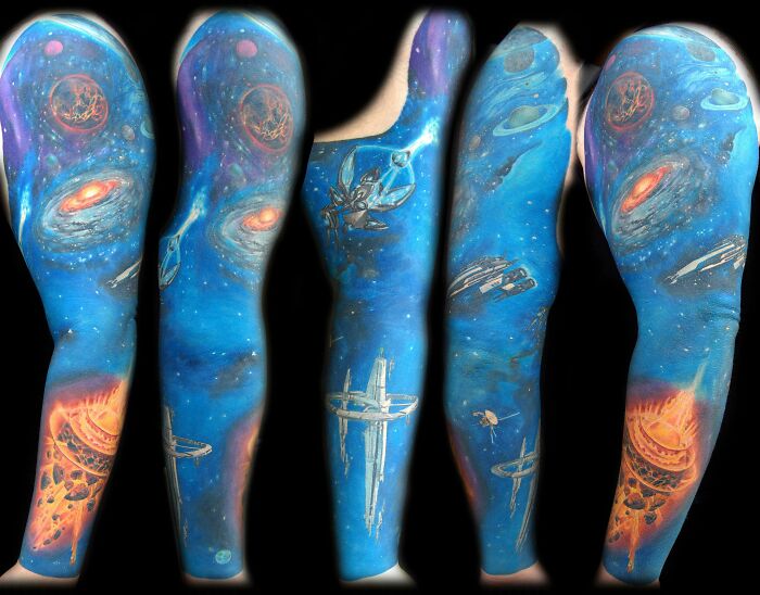 Space tattoos featuring a cosmic theme with planets, galaxies, and spaceships in vibrant colors.