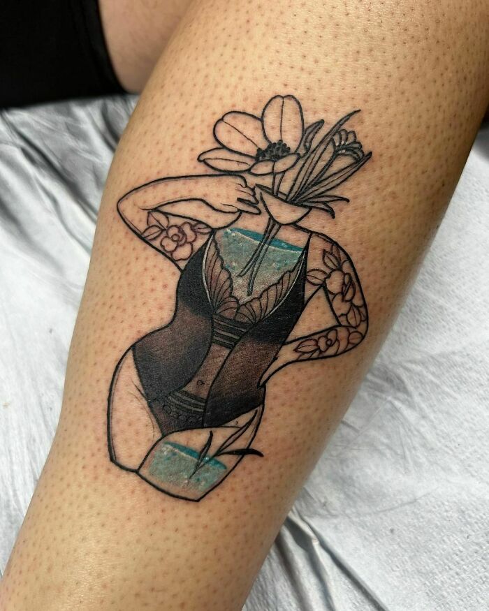 Abstract self-love tattoo of a headless figure with flowers, symbolizing empowerment and deep meaning.