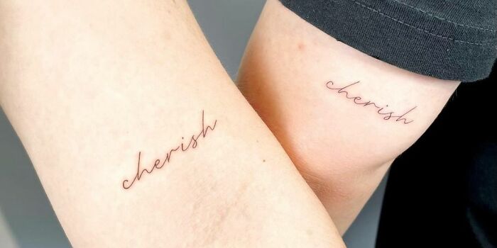 Matching "Cherish" tattoos celebrating self-love on two arms.