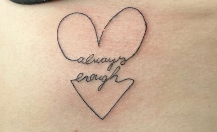Self-love tattoo design featuring a heart with the words "always enough" inside.