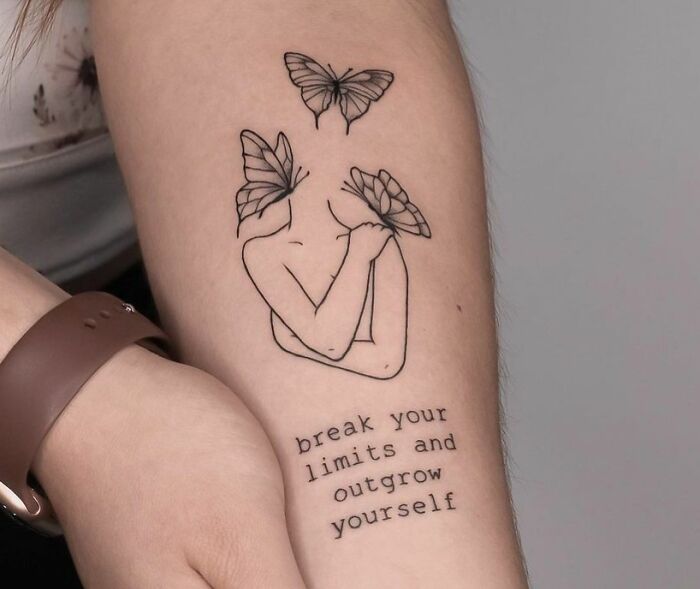 Self-love tattoo with butterflies and the phrase "break your limits and outgrow yourself."