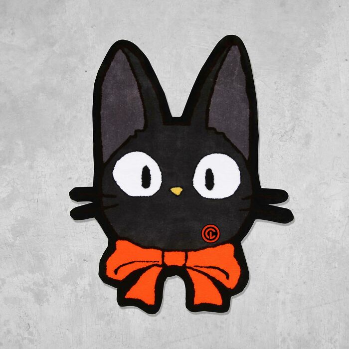Colorful black cat head rug