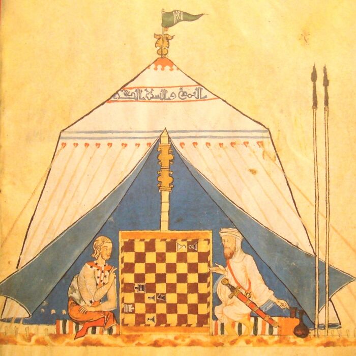 the illustration of men playing chess 