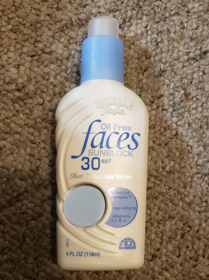 Sunblock Bottle That Has A Built In Mirror So You Can See Your Face When Applying