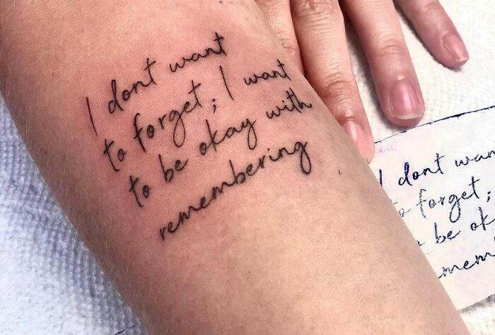 Word tattoo idea: "I don't want to forget; I want to be okay with remembering" on a person's forearm.