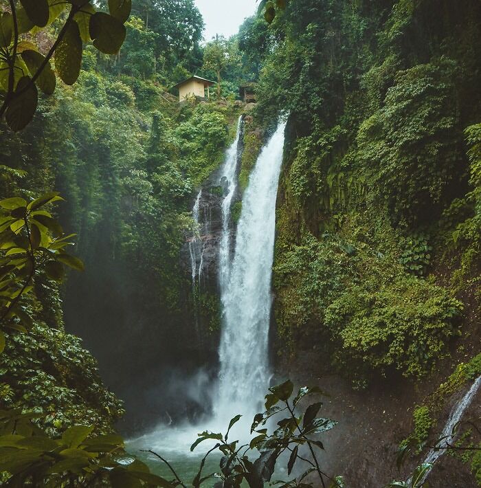 Waterfall falling from a mountain in a river 