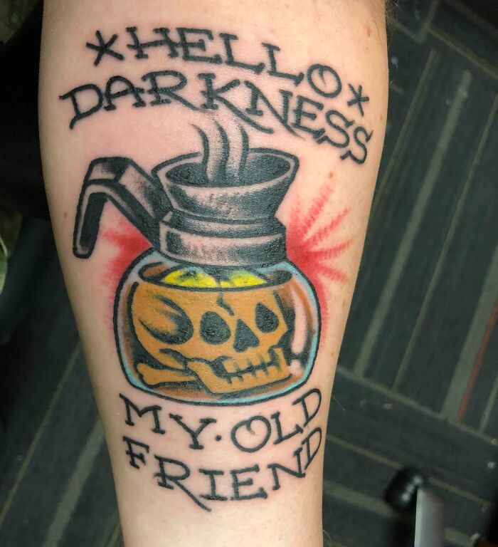 Tattoo of a coffee pot with a skull, surrounded by the phrase "Hello Darkness My Old Friend," showcasing a creative word tattoo idea.