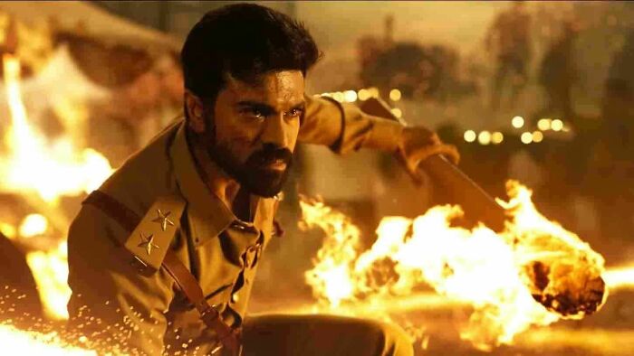 Raju holding a flame torch