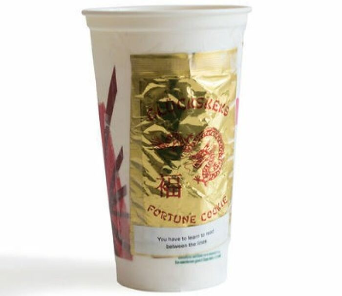 Empty Bag Of Fortune Cookies Attached To A Starbucks Cup