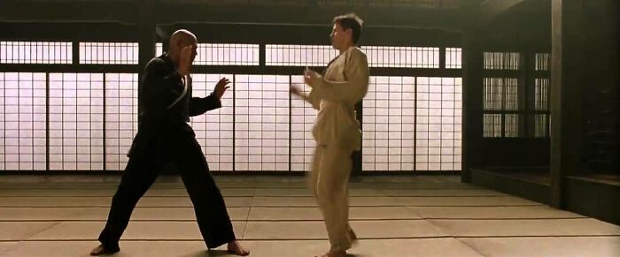 Neo and Morpheus fighting 