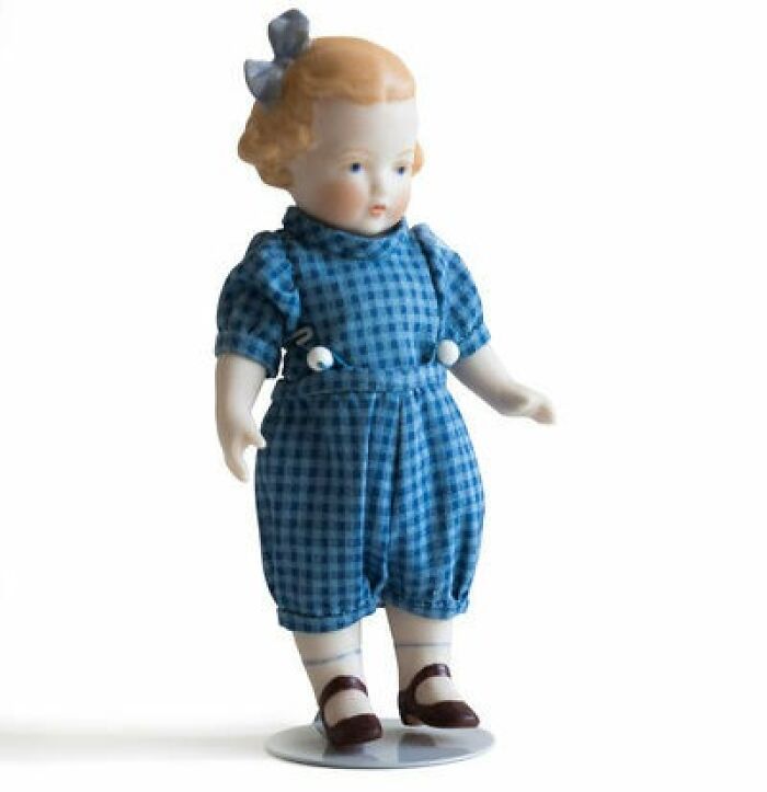 A Forget-Me-Not Porcelain Doll