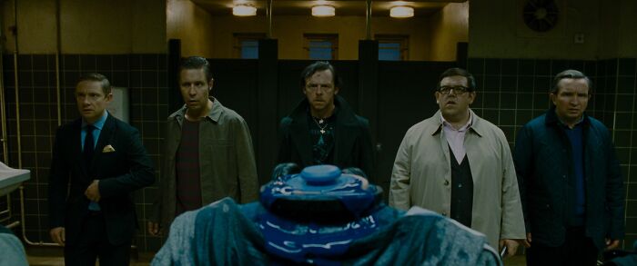 Man standing in front of Alien Androids