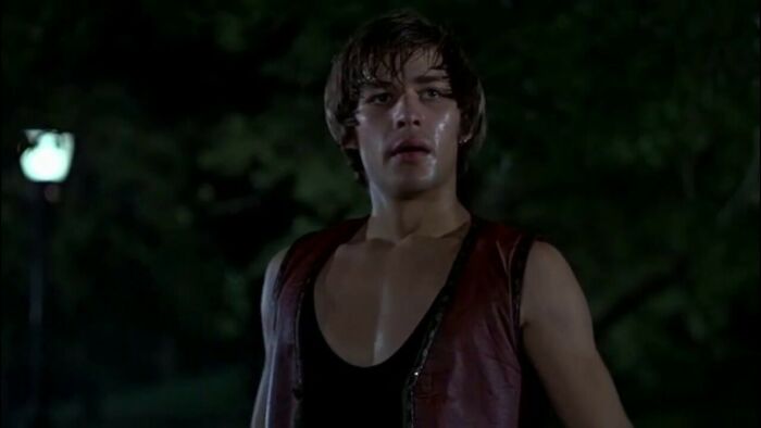 man wearing red shirt 