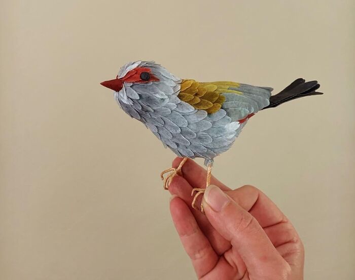 colorful bird made out of the paper
