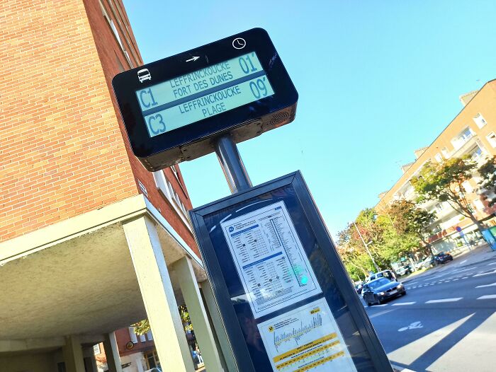 Bus stop gadget displaying routes in a city setting, part of interesting gadgets globally.