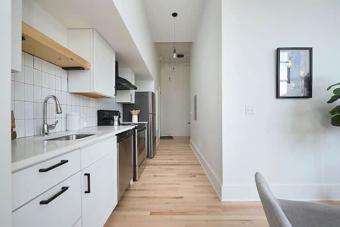 It Took 3 Years To Turn An Abandoned 1929 School Building Into This 31-Apartment Residential House