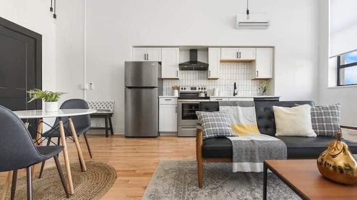 It Took 3 Years To Turn An Abandoned 1929 School Building Into This 31-Apartment Residential House