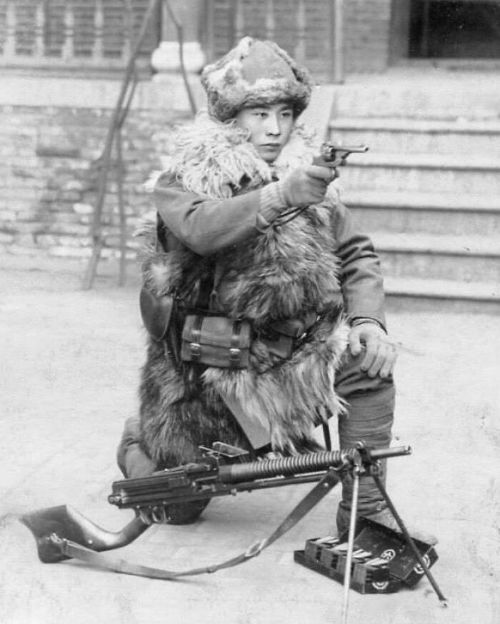 Pictured Above Is A Japanese Soldier Posing With A Type 26 Revolver And A Type 11 Machine Gun, Date Unknown