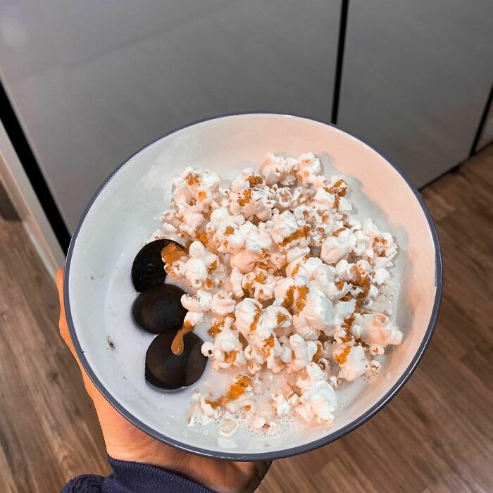 Bowl of popcorn and milk