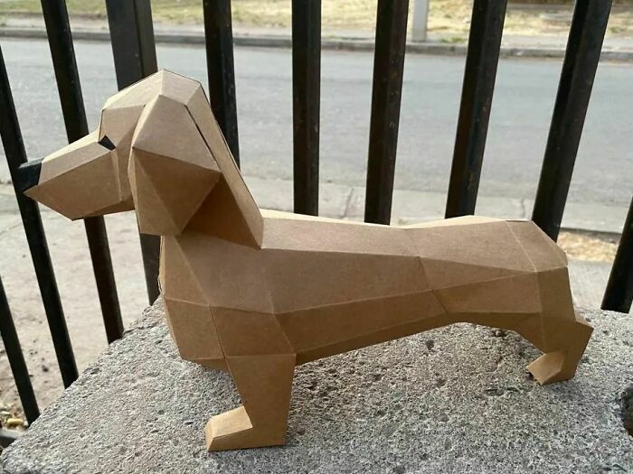 a brown dog made out of a paper