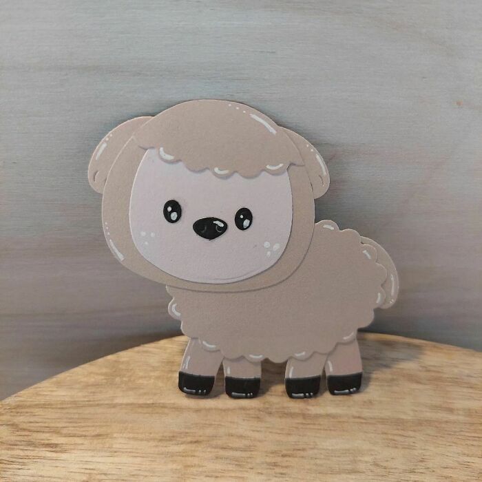 a sheep made out of a paper 