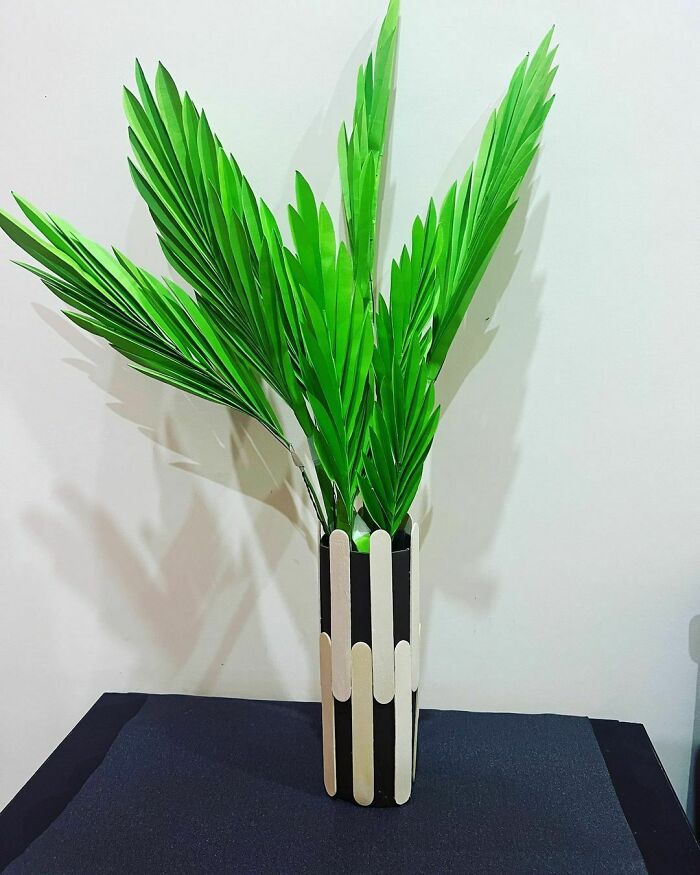 a green paper plant in a pot