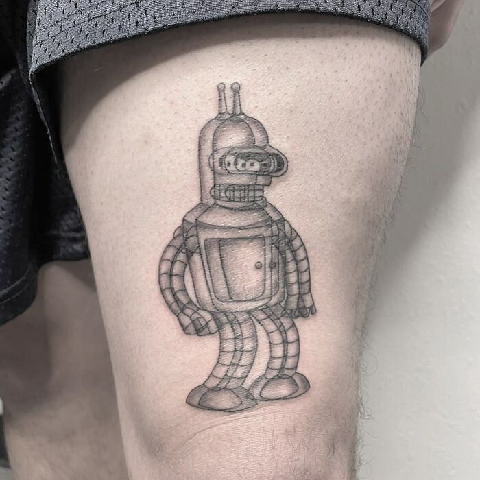 Robot tattoo design on a thigh, part of a collection of moving tattoos.