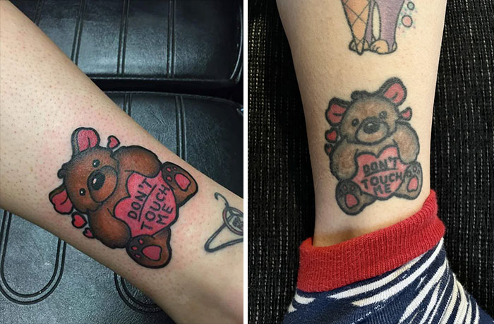 Aged tattoo of a bear saying "Don't Touch Me" showing faded details over time.