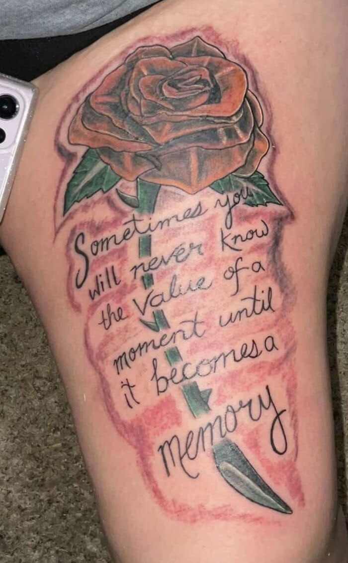 Bad tattoo featuring a rose and misspelled quote about moments and memories.
