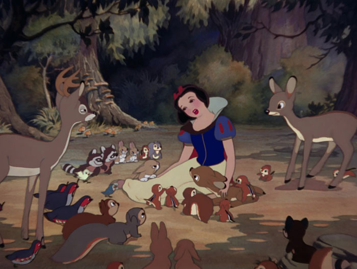 Cartoon character in forest surrounded by animals, illustrating versatile cartoon quotes.