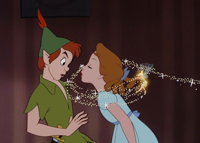 Peter Pan and Wendy moment with Tinker Bell's magic sparkles, illustrating timeless cartoon quotes.