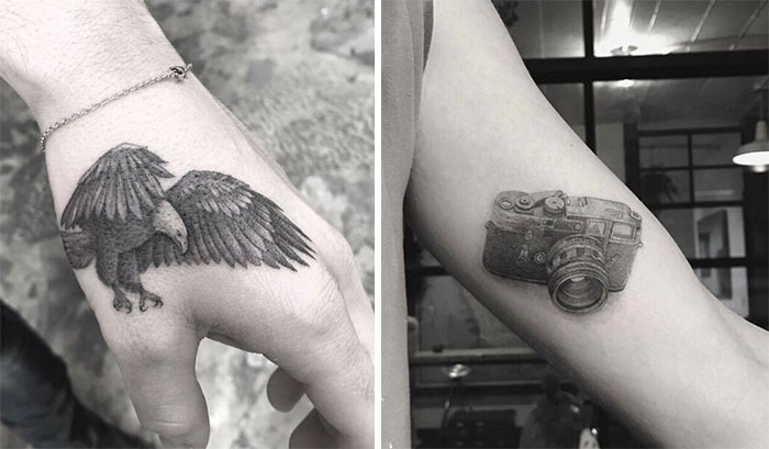 Eagle tattoo on a hand and camera tattoo on an arm, showcasing celebrity tattoos.
