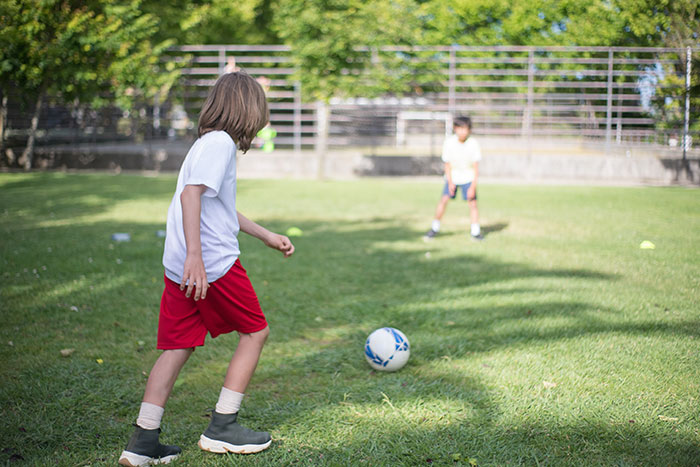 Children playing soccer