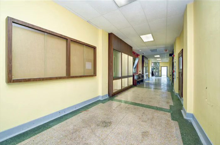 It Took 3 Years To Turn An Abandoned 1929 School Building Into This 31-Apartment Residential House