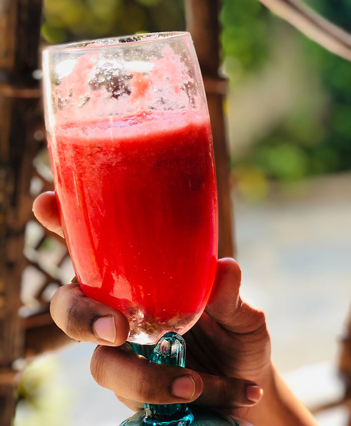 Woman holding cocktail