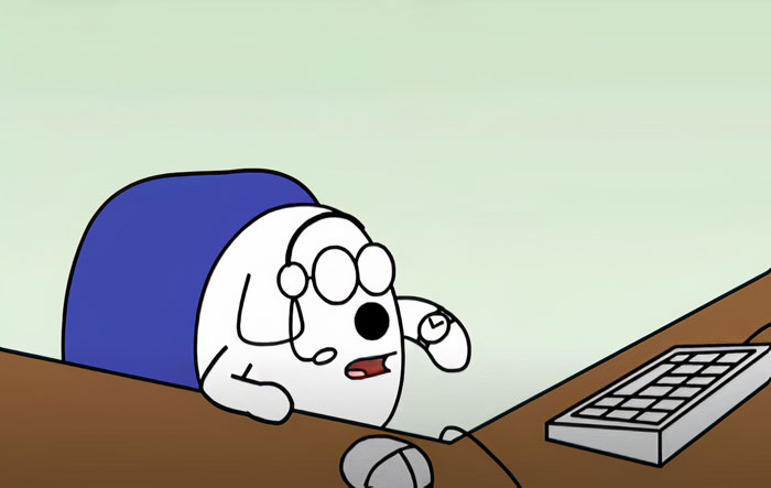 Cartoon dog with headset and glasses at a desk, using a computer, embodying famous cartoon dogs' cuteness.