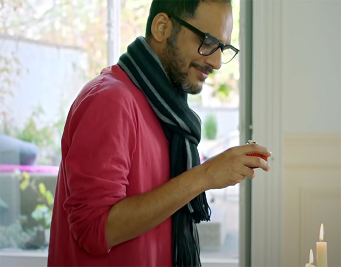 Maacher Jhol character wearing red shirt