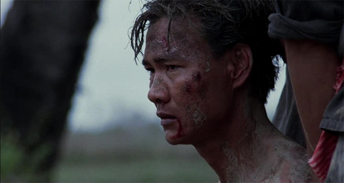 Haing S. Ngor sitting and dirty 