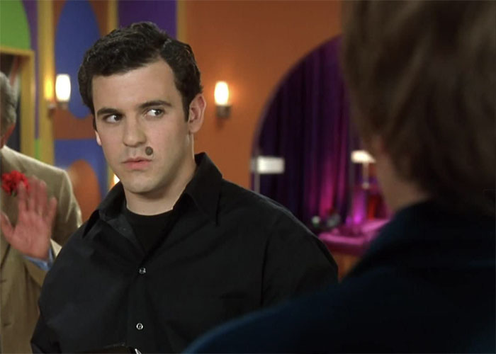 Fred Savage looking at someone suspiciously 