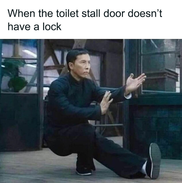 Man in defensive pose, captioned "When the toilet stall door doesn’t have a lock," illustrating relatable meme humor.