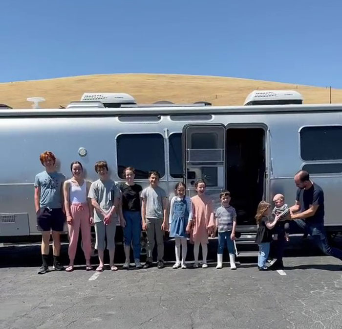 Family Of 12 Shows How They Manage To Travel In A 30-Foot Trailer And People Online Don't Approve