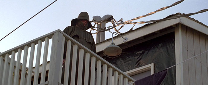 Benjamin Willis wearing a raincoat 