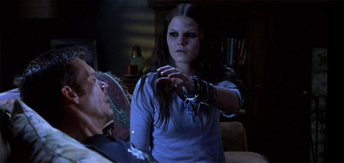 Lisa reaching hand out to a man 