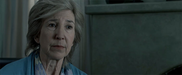 Elise wearing blue sweater 