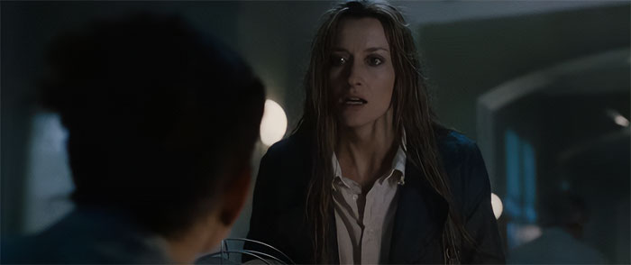 Alistair wearing a white shirt and black jacket 