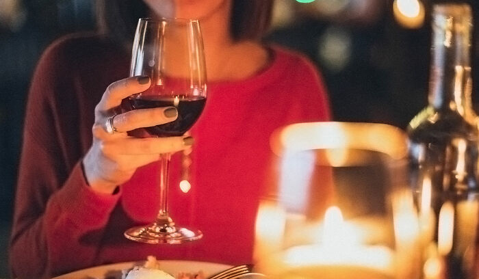 Person drinking wine